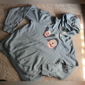 RVCA Light Blue Hoodie with Graphic Design